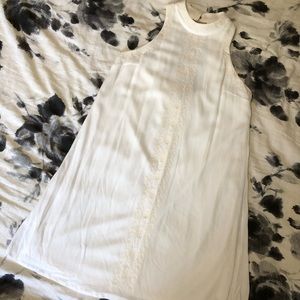 White dress with gold embroidery